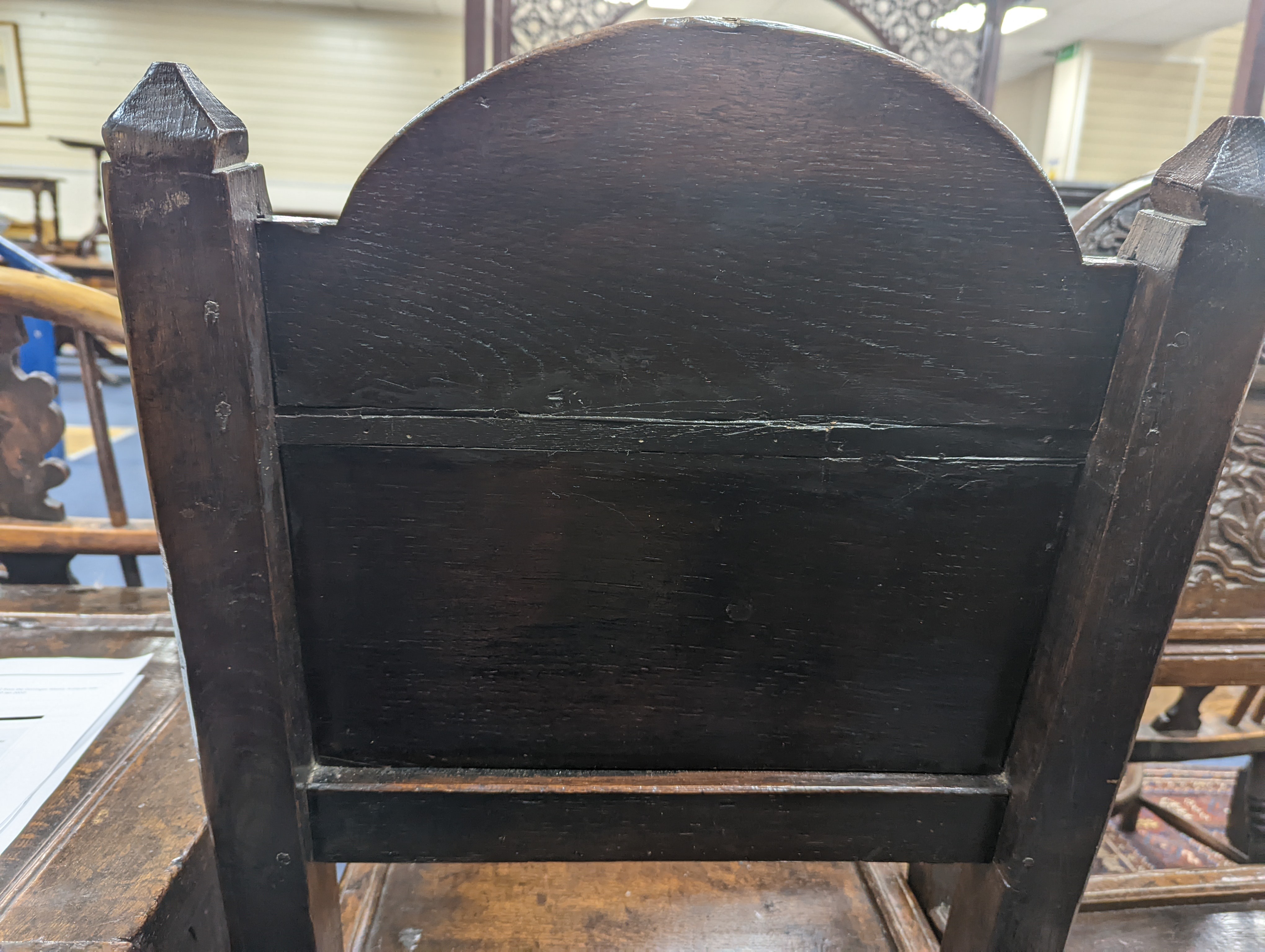 A pair of 17th century Lancashire carved oak side chairs, width 45cm, depth 39cm, height 101cm